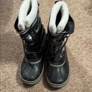 Black and White Sorel Winter Boots